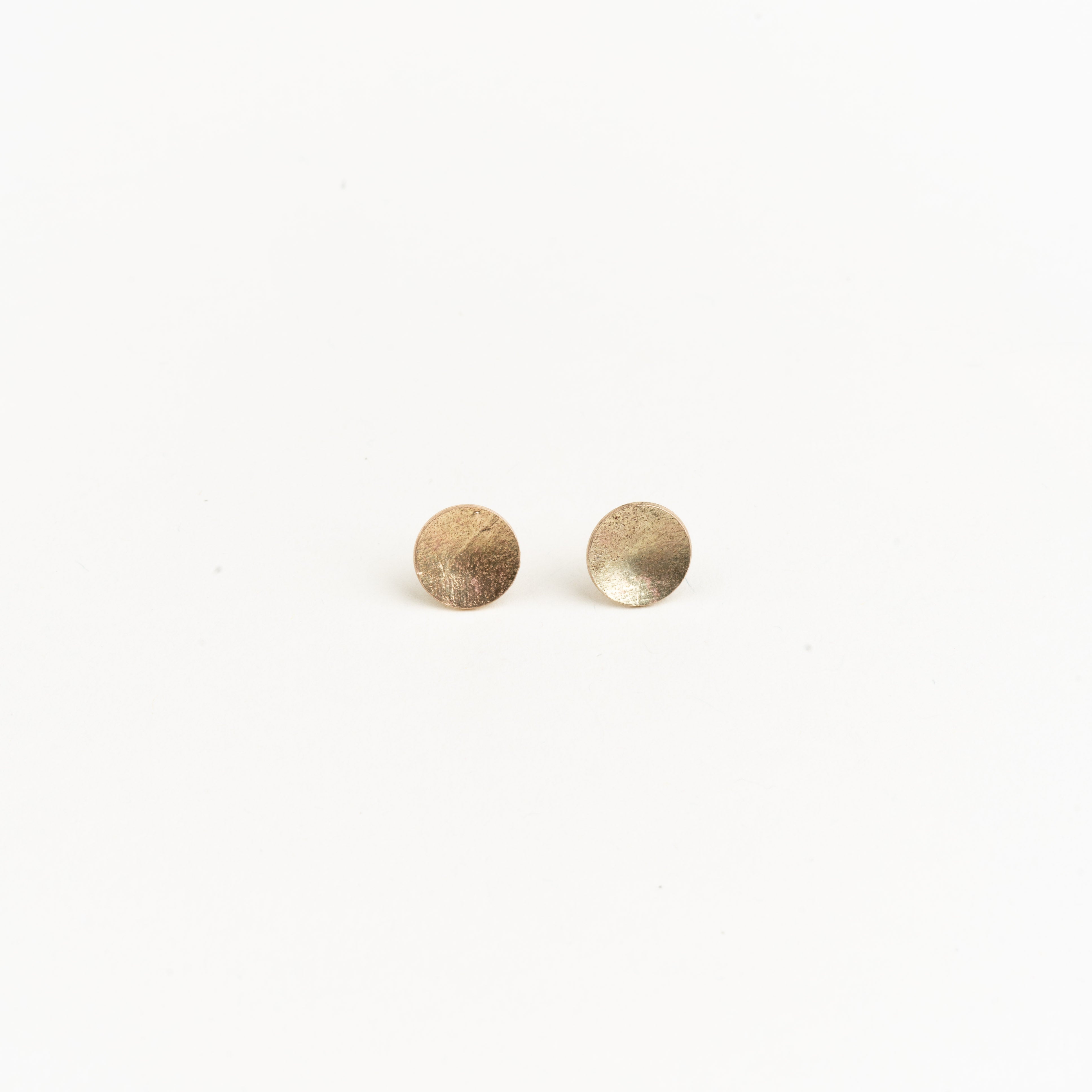 Flat on sale gold studs